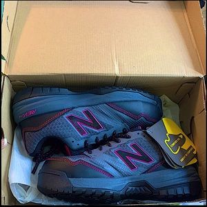 Durable work shoes with steel toe for protection.